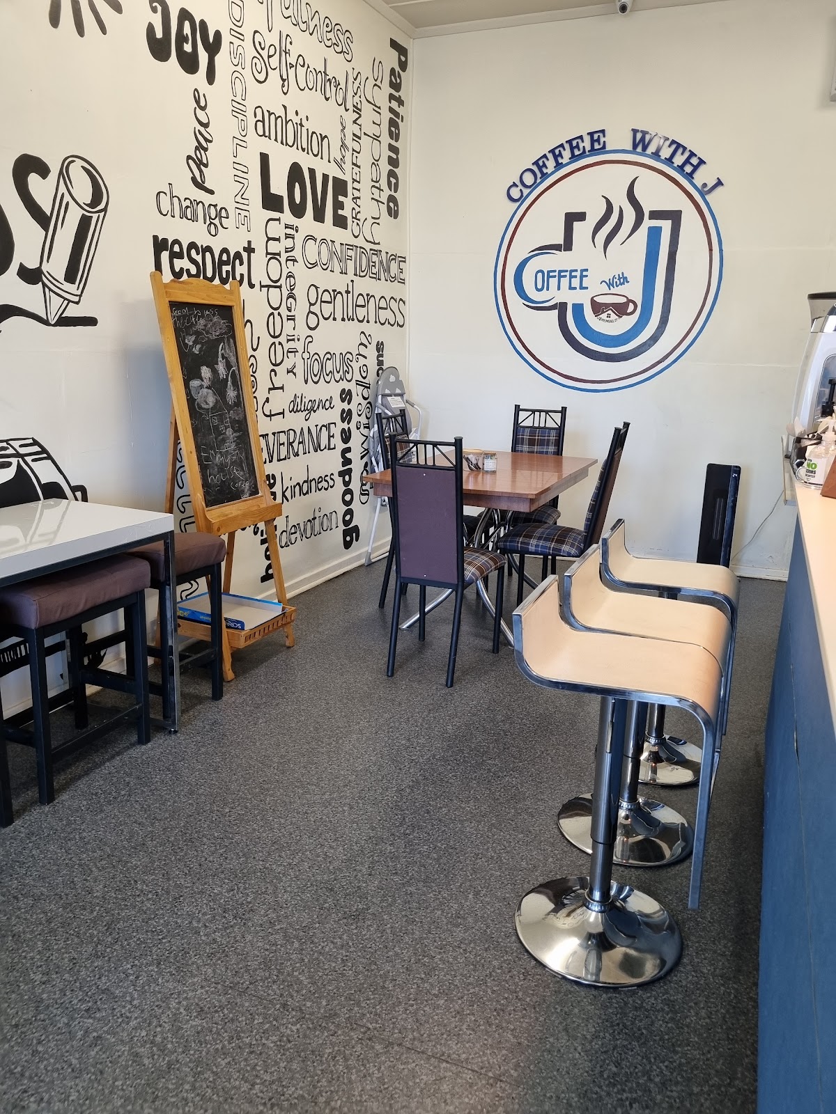 Cafe interior with the Coffee with J wall mural